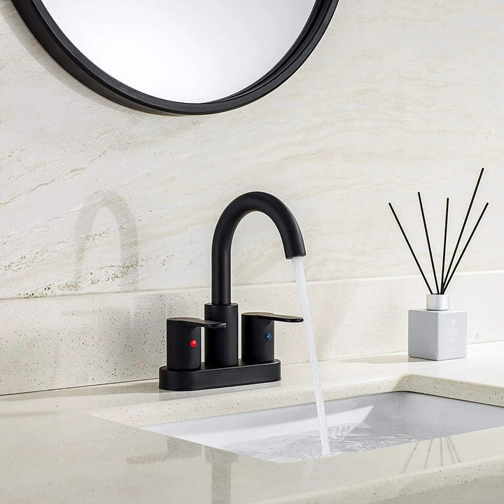 Brushed gold 4 inch wide spread bathroom faucet