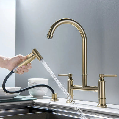Brushed gold bridge kitchen faucet with side pull out hand spray gun
