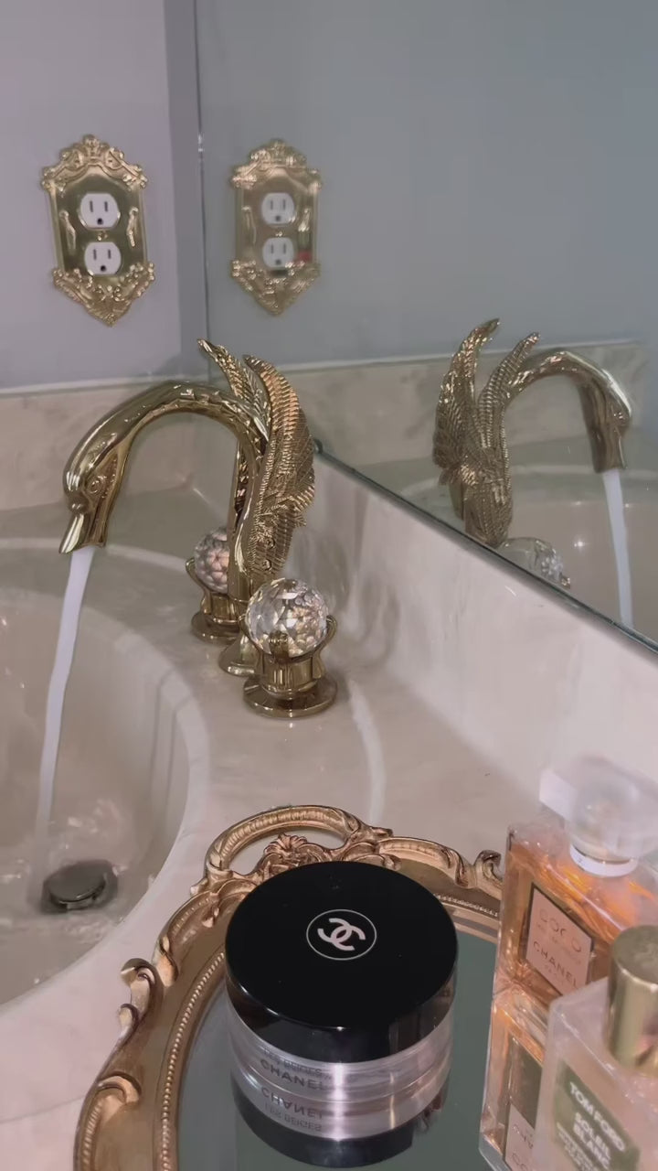 Gold Polished Swan 8 Inch Wide Spread Lavatory Faucet With Crystal Handles