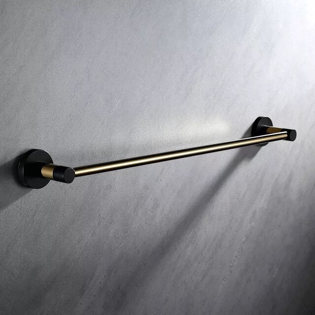 Black with brushed gold bathroom accessories