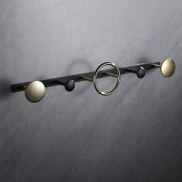 Black with brushed gold bathroom accessories