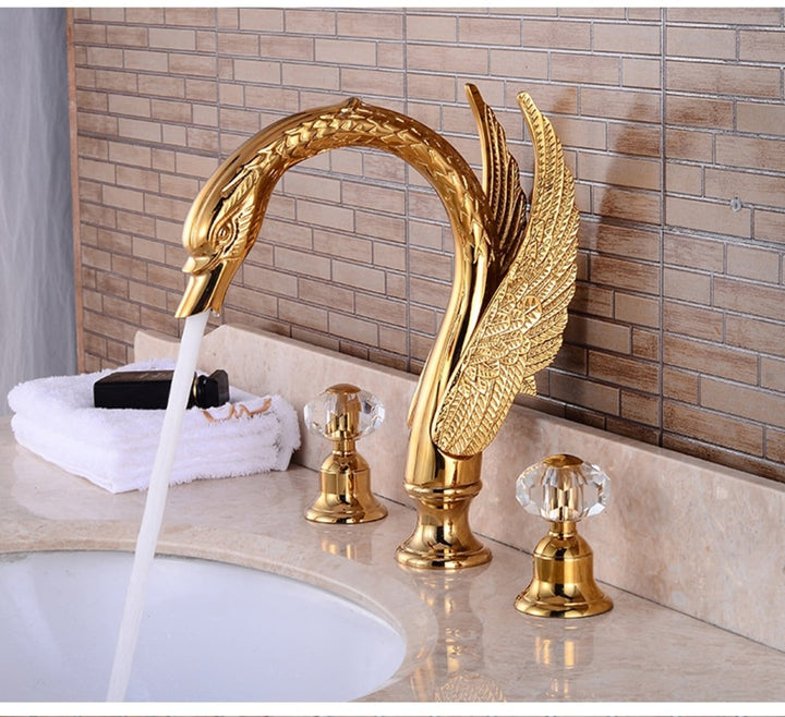 Gold Polished Swan 8 Inch Wide Spread Lavatory Faucet With Crystal Handles