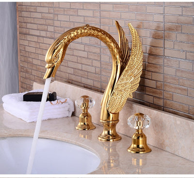 Gold Polished Swan 8 Inch Wide Spread Lavatory Faucet With Crystal Handles