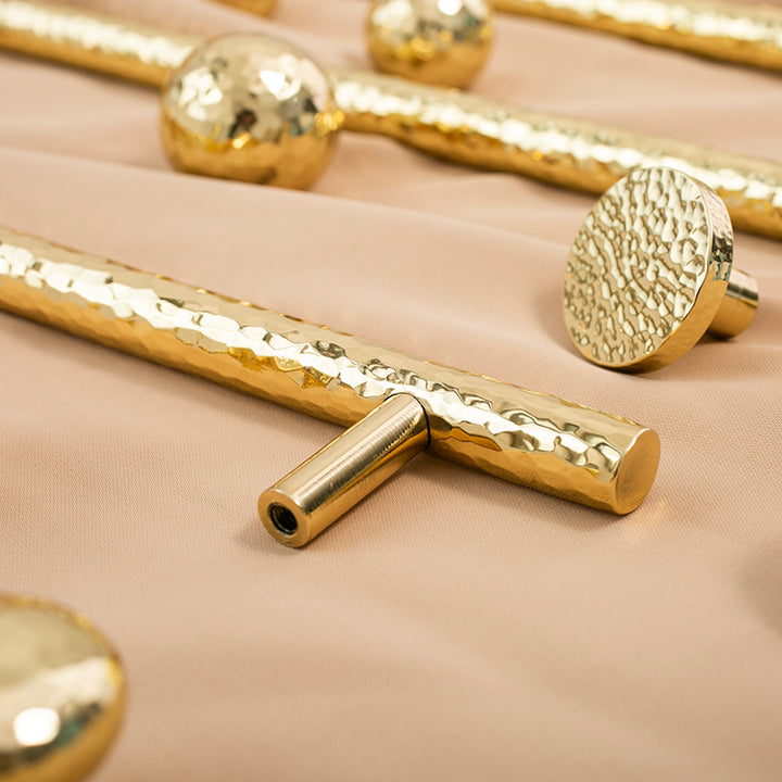 Nordic Gold Polished Hand Hammered Cabinet door handles and knobs.