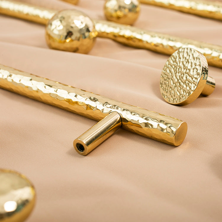 Nordic Gold Polished Hand Hammered Cabinet door handles and knobs.