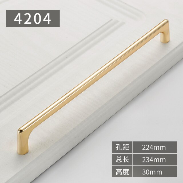 Gold polished cabinet door handles and knobs